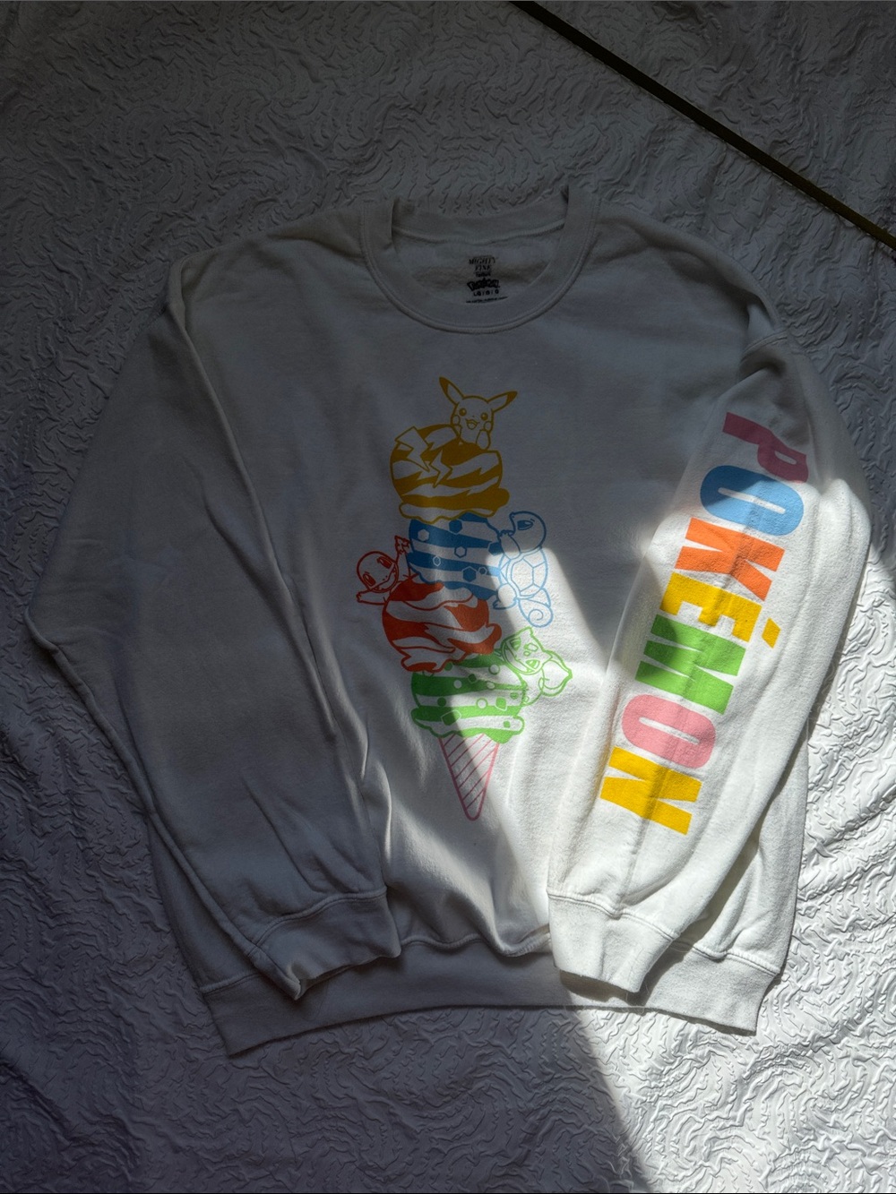 Pokemon White Crewneck Sweatshirt with Rainbow Stack Graphic